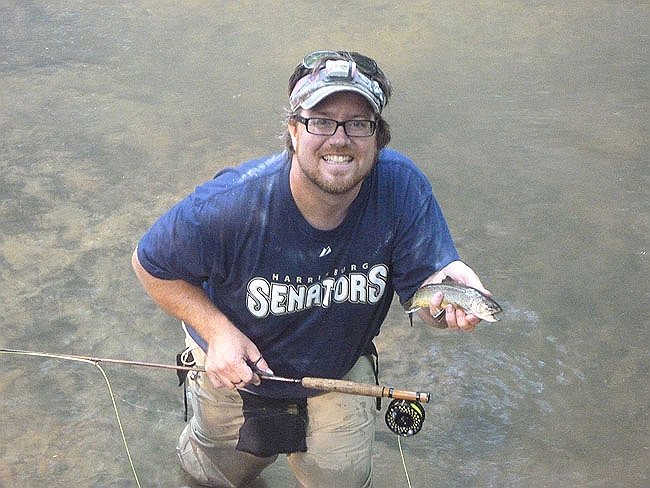 Neal with a brookie.JPG